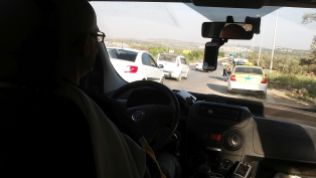 Adi took us to meet Sameh’s father, Muhammed. We drove a bit and then separated: he had to go through an Israeli checkpoint for Arabs. We didn’t. We drove by one designated for those cars which have Israeli number plates